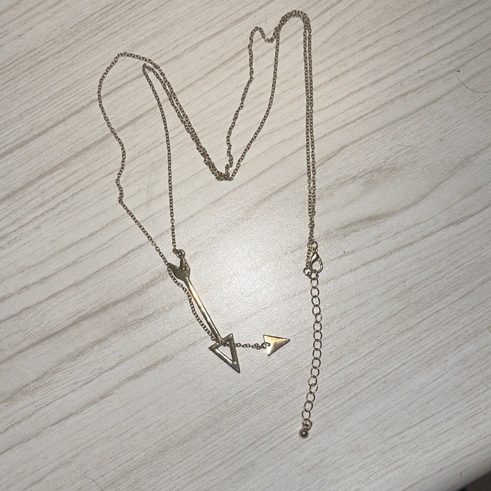 Long gold arrow necklace